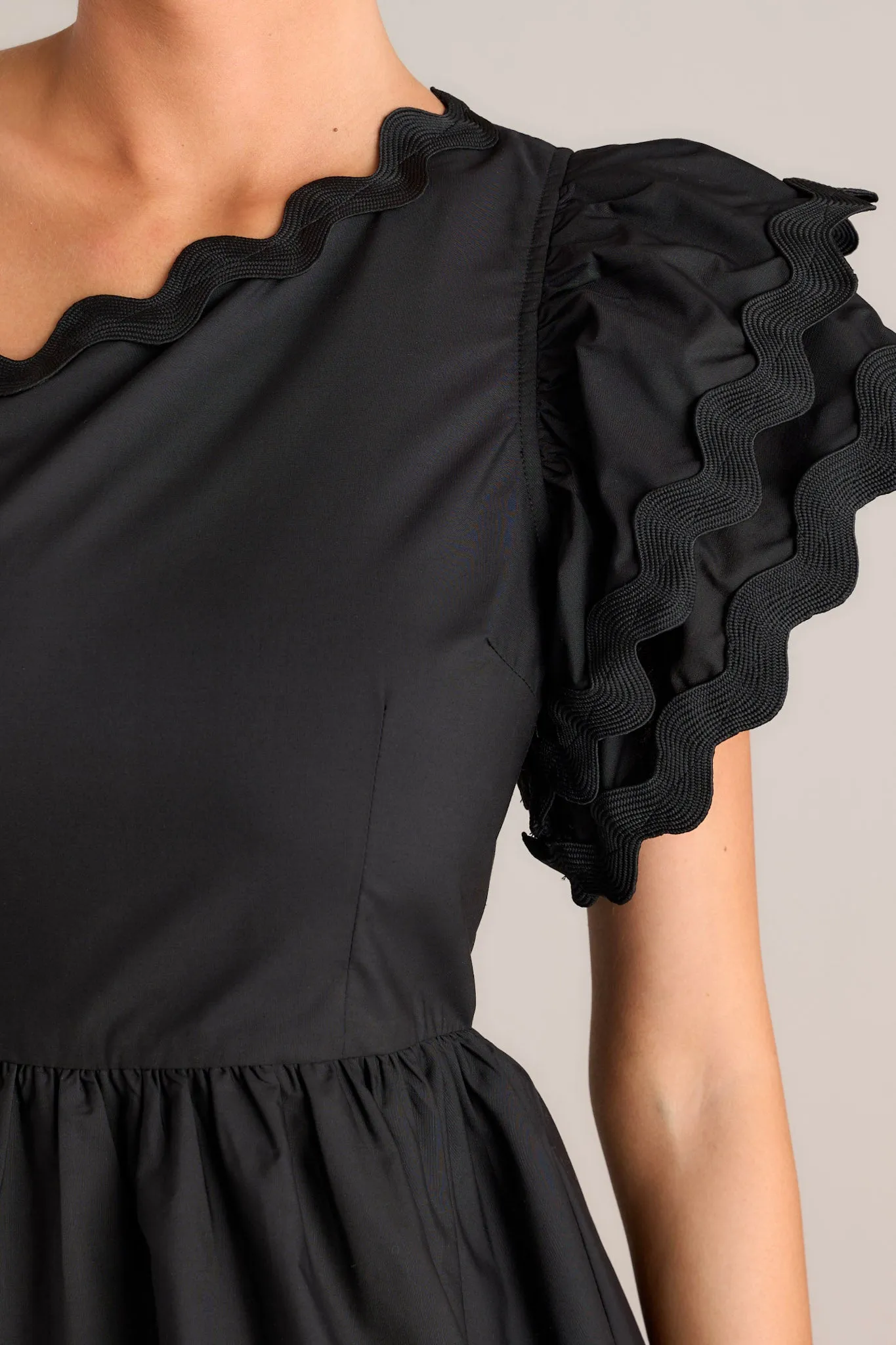 Flirty Flutter Black Scallop Tiered One Shoulder Romper